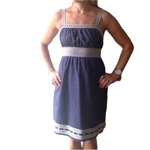 Navy blue cotton dress with white trim detail